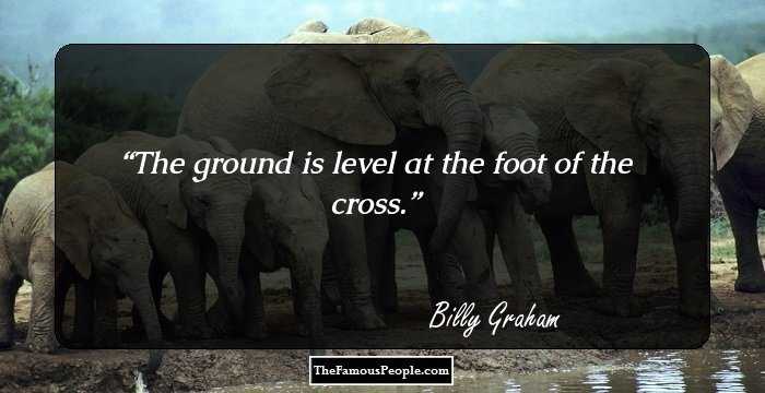 The ground is level at the foot of the cross.