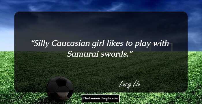 Silly Caucasian girl likes to play with Samurai swords.